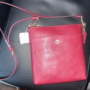 Brand new Burgundy cross body coach bag